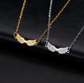 A stainless steel necklace with a winged design, displayed on a tag with an illustration of Hermes, the Greek God of commerce, wealth, and communication.