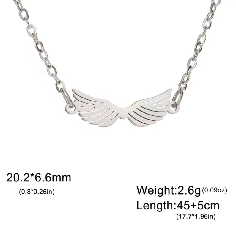 A stainless steel necklace with a winged design, displayed on a tag with an illustration of Hermes, the Greek God of commerce, wealth, and communication.